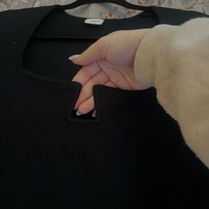 Elegant Black Top with Unique Neckline